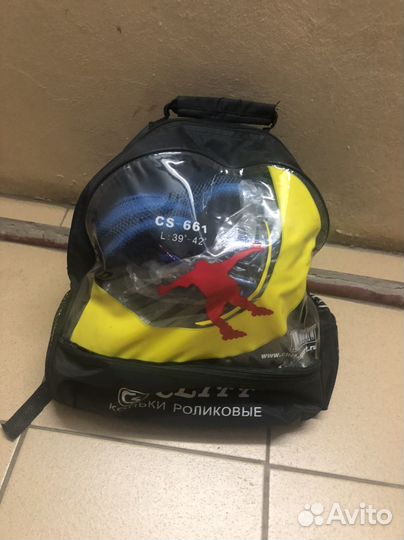 Роликовые коньки