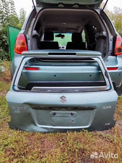 Дверь хлопушка Сузуки сх4 оригинал