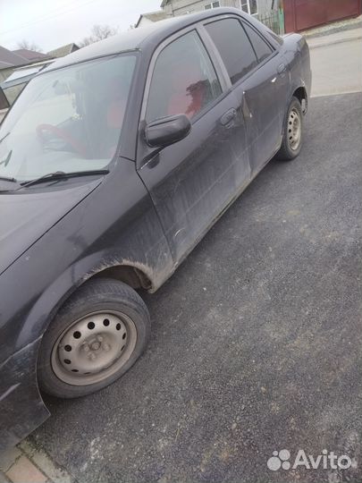 Mazda Familia 1.5 AT, 1998, 400 000 км