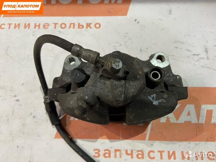 Суппорт тормозной передний правый Volkswagen Golf