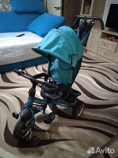 Трехколесный велосипед с ручкой