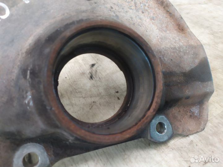 Кулак поворотный передний левый Mitsubishi Lancer