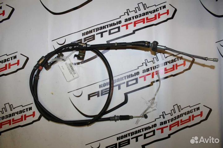 Тросик ручника mazda premacy CP8W cpew левый бараб