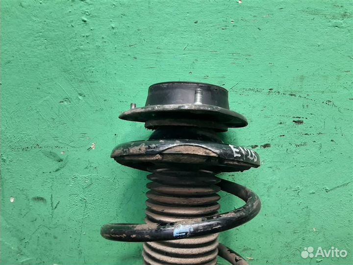 Стойка амортизатора передняя левая Subaru Foreste