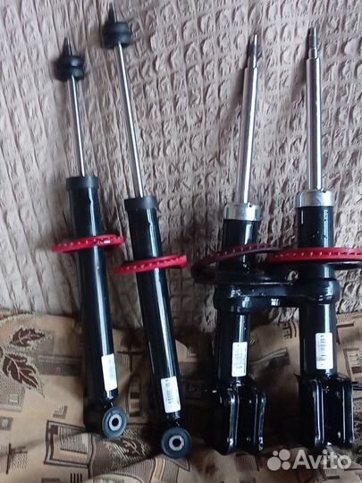 Стойки амортизаторные