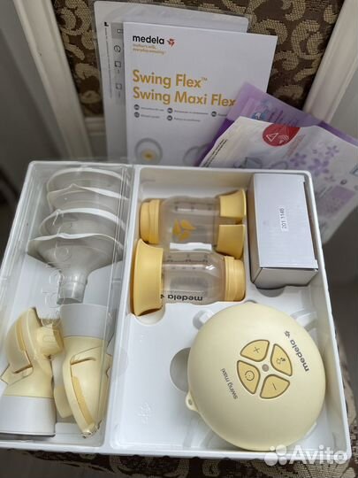 Молокоотсос medela swing maxi flex электрический