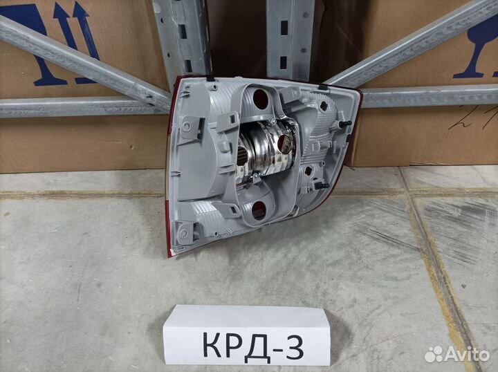 Фонарь левый Шкода Рапид