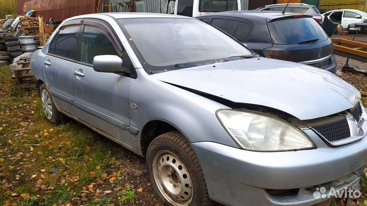 Коллектор выпускной Mitsubishi Lancer 9