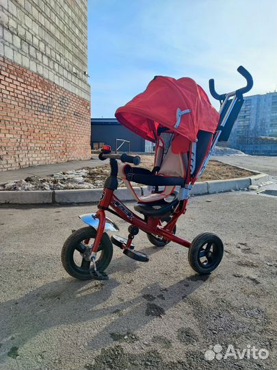 Трехколесный велосипед с ручкой