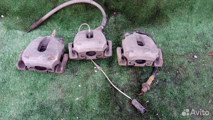 Суппорт тормозной задний BMW 5 серия