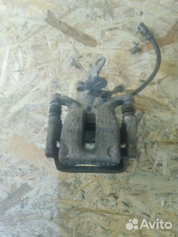 Суппорт тормозной задний левый seat Leon 2015