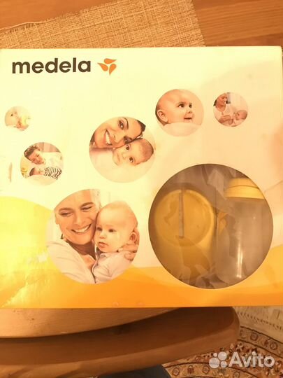 Молокоотсос medela swing