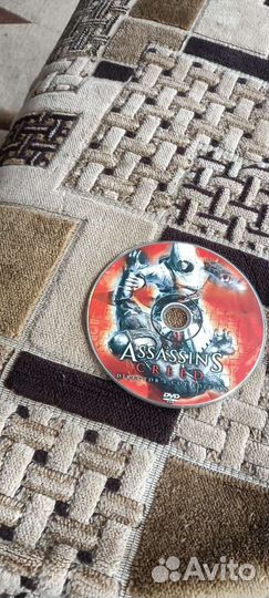 Диск с играми ассасин Крид и Turok цена 600