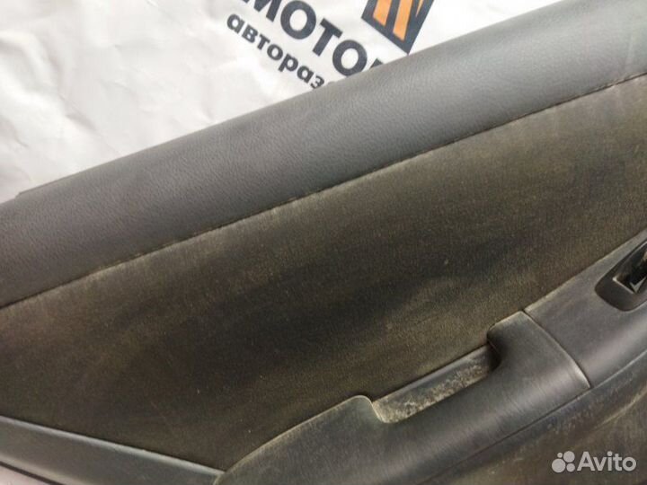 Обшивка двери задняя левая Toyota Corolla E12 1.6