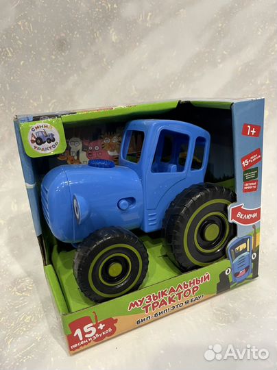 Игрушка синий трактор