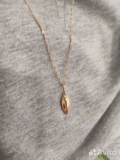 Золотой кулон