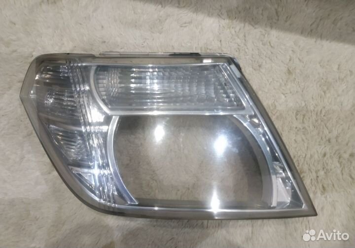 Стекло правой фары Патфайндер Навара рестайлинг
