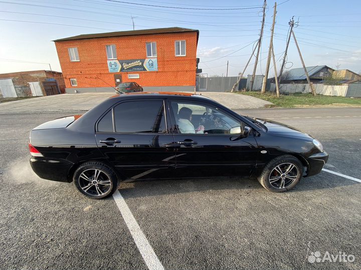Mitsubishi Lancer 1.6 МТ, 2005, 305 000 км