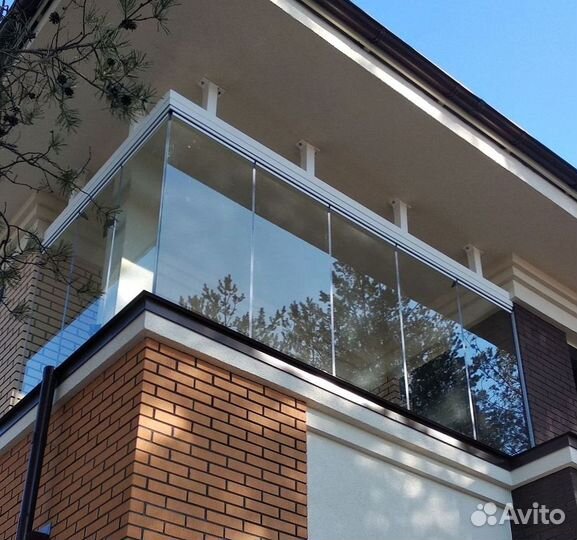 Безрамное раздвижное остекление