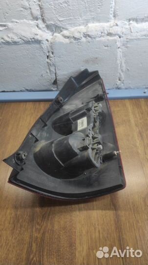 Фонарь заднего хода задний левый Nissan Primera P