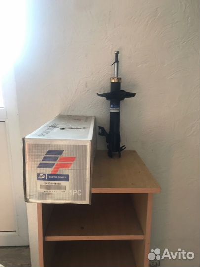 Амортизатор газовый 54303-4M486 nissan 332117