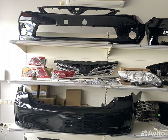 Бампер задний Toyota Corolla 180