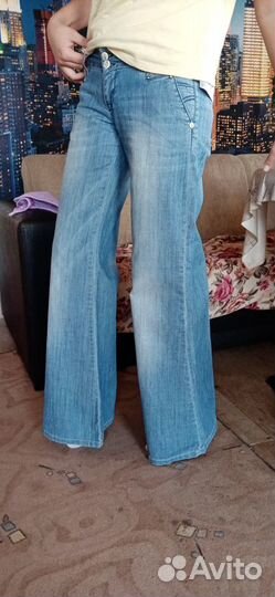 Джинсы клеш