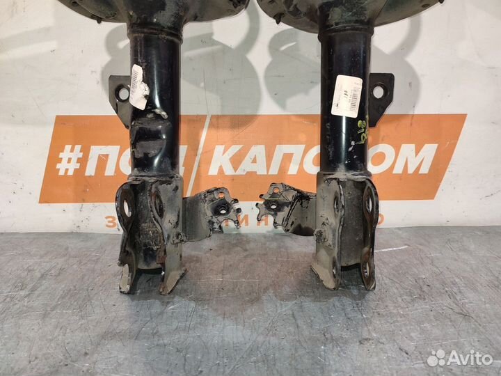 Стойка амортизатора передняя Toyota Camry XV50