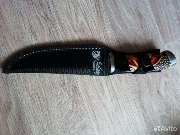 Нож