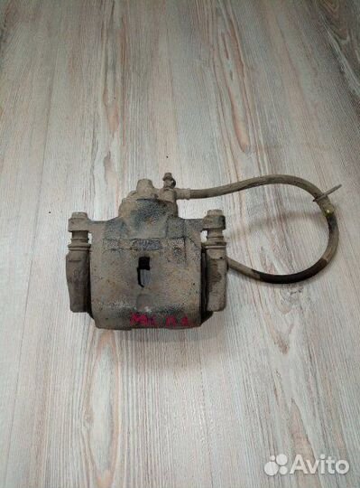 Суппорт тормозной перед Geely MK Лев