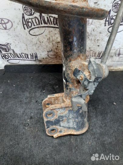 Амортизатор передний левый Peugeot 308