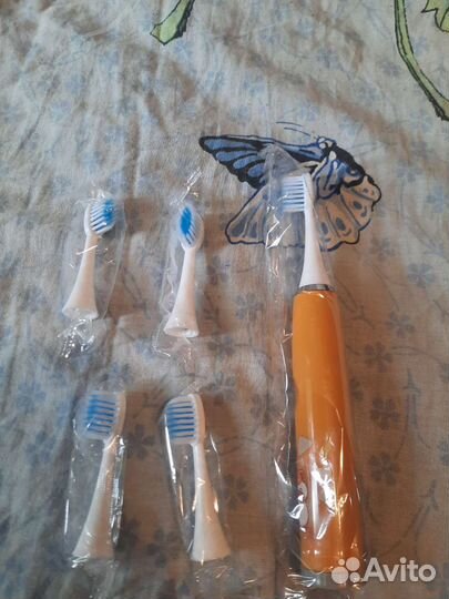 Электрическая зубная щетка детская