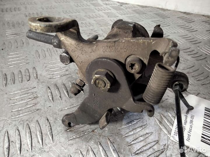 Суппорт задний левый Ford Focus 1