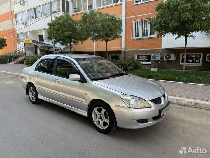 Mitsubishi Lancer 1.6 МТ, 2004, 195 000 км