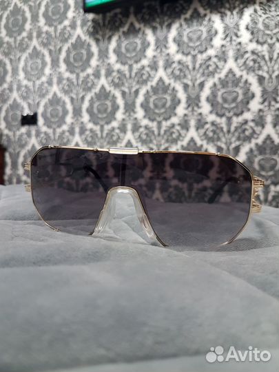 Солнечные очки женские