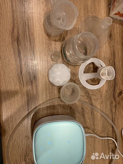 Электронный молокоотсос