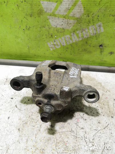 Суппорт задний левый Ниссан Теана