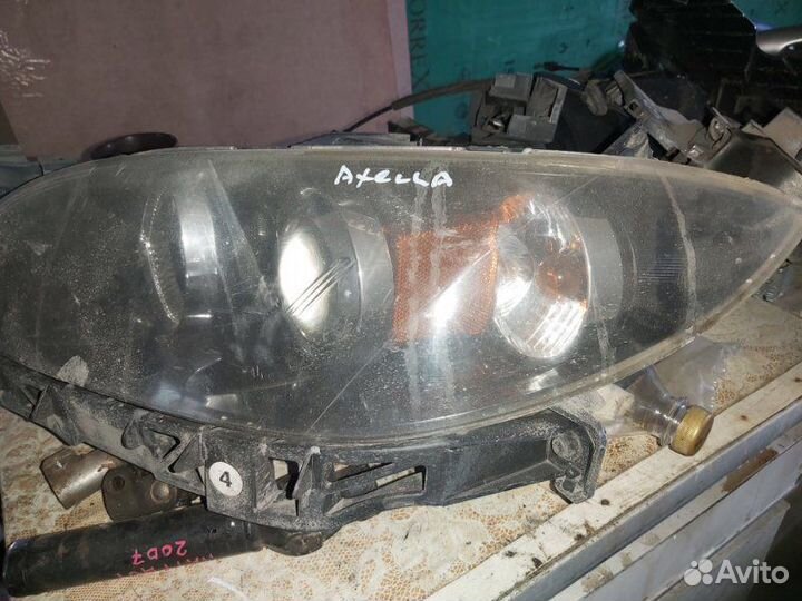Фара галогеновая передняя левая Mazda Axela BK5P