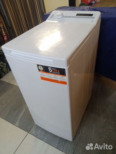 Стиральная машина с вертикальной загрузкой