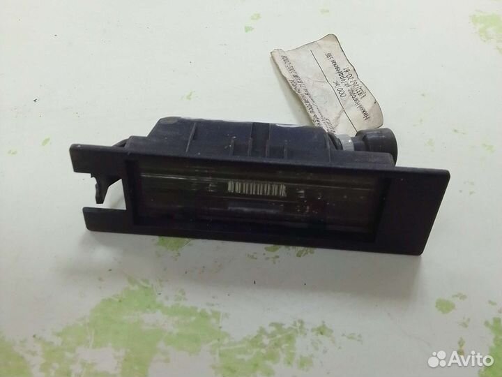 Фонарь подсветки номера Opel Vectra C хетчбэк