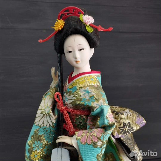 Китайская фарфоровая кукла