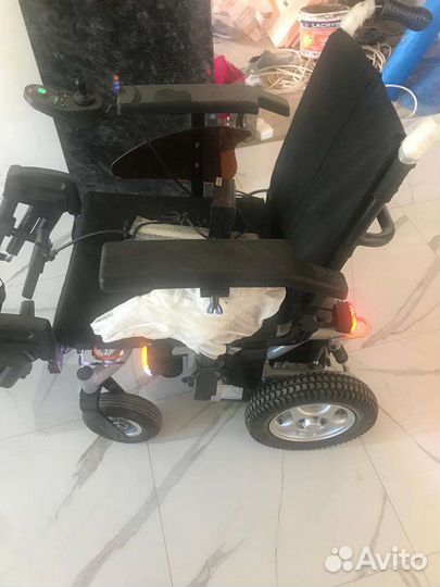 Продам электрический инвалидную коляску