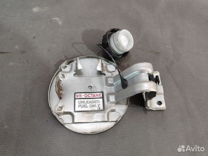 Лючок бензобака Mitsubishi Lancer X