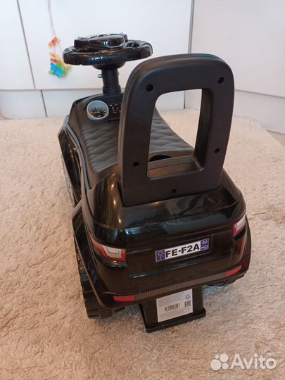 Машинка-каталка со светом и звуком новая