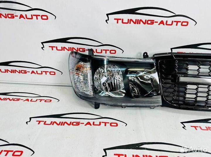 Фары (темные) с решеткой Toyota Land Cruiser 100