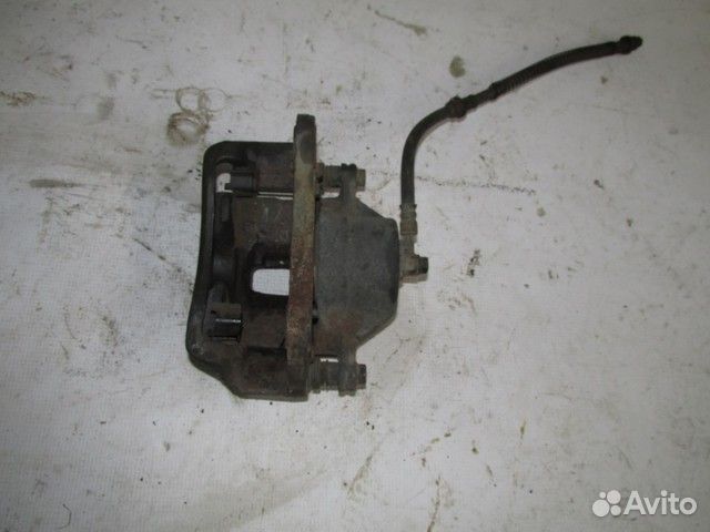 Суппорт тормозной передний правый Hyundai Tucson 1