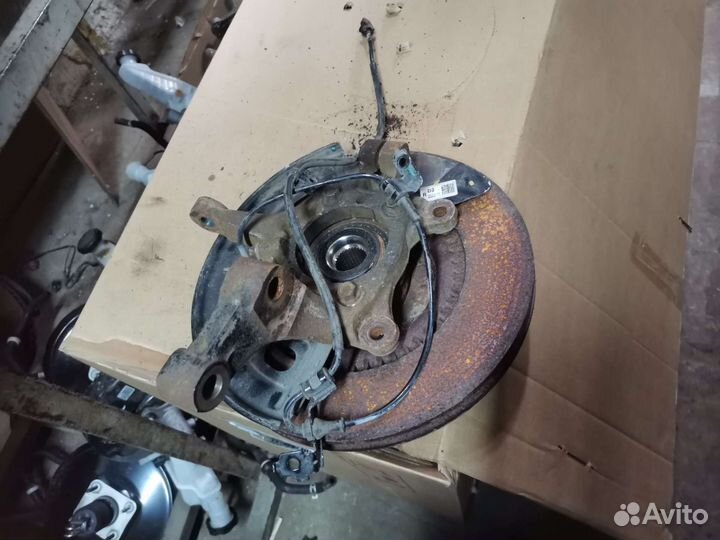 Кулак поворотный левый Kia Optima 4 JF