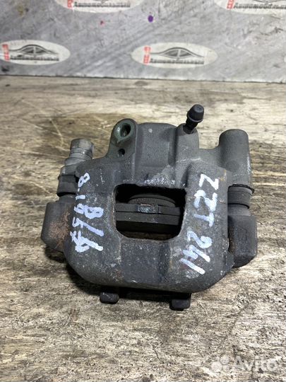 Суппорт зад лево c Toyota Caldina ZZT241W 1ZZ-FE