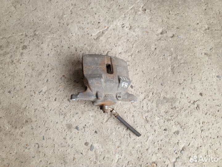 Суппорт тормозной передний Nissan Trail T32