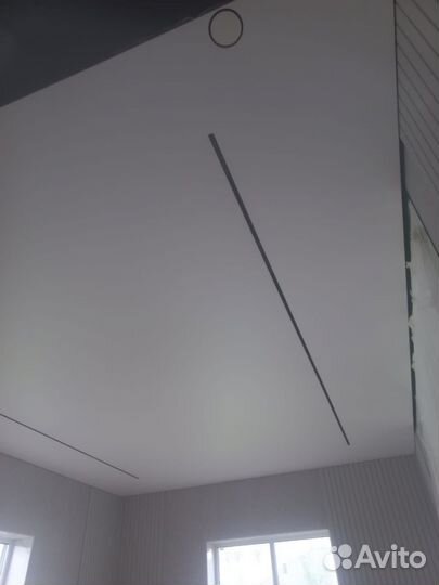 Натяжные потолки